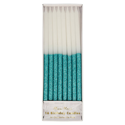 Box of 16 tall white birthday candles dipped in blue glitter