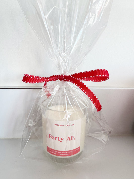 Assorted cello wrapped Mischief Candles with no box